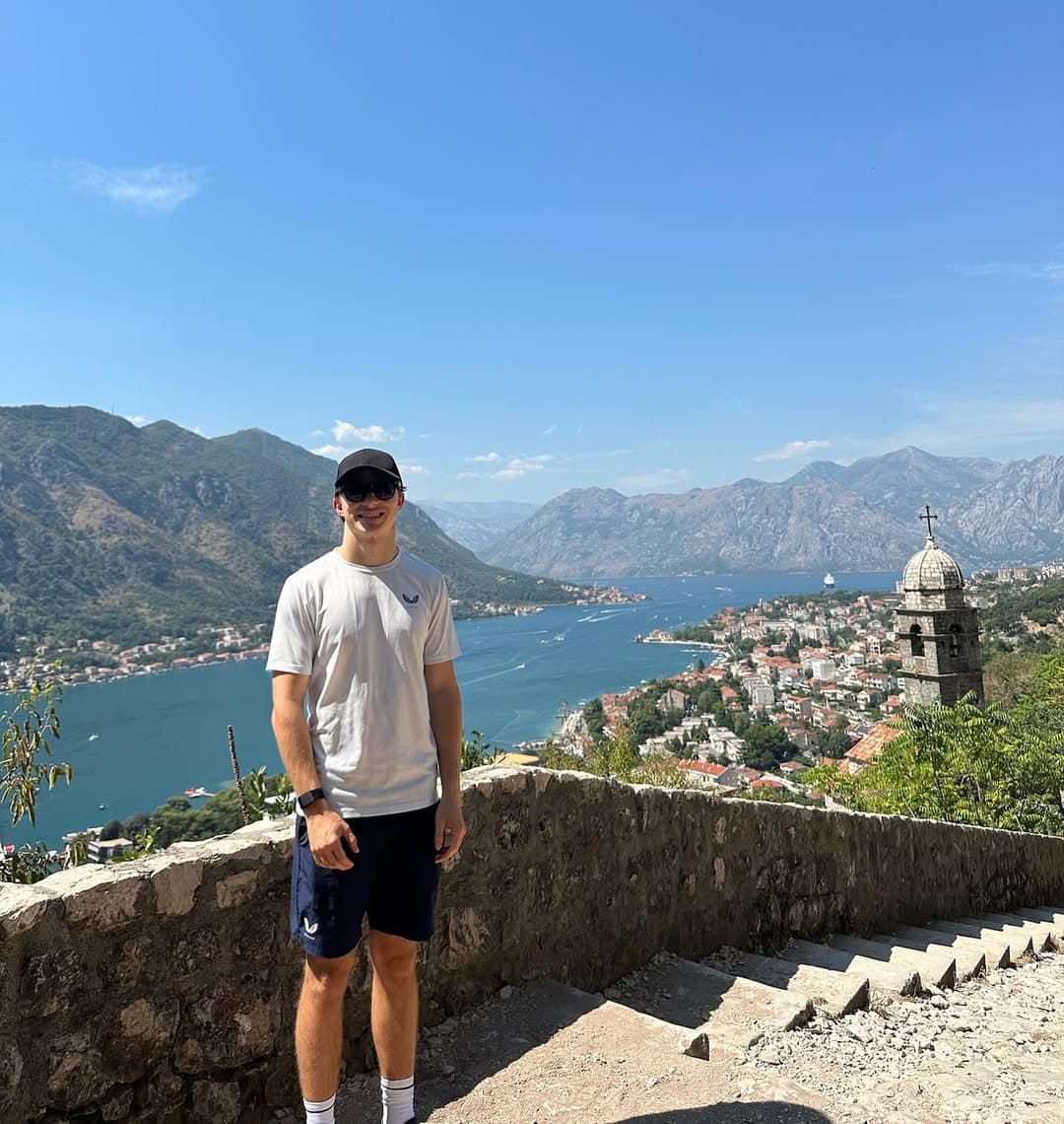 Formula 1 driver Oscar Piastri wearing a black alcantara cap from Varisty Headwear