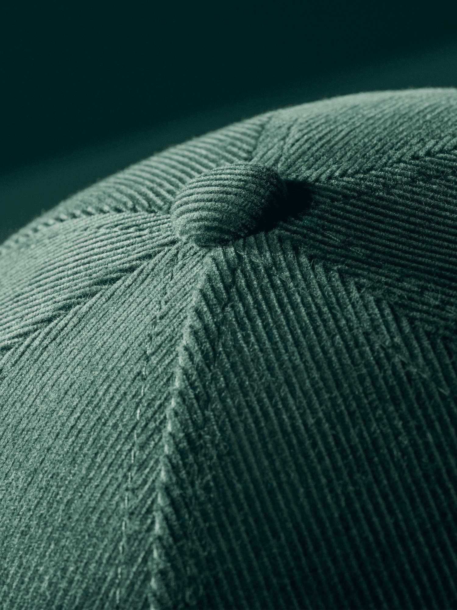 Top view of a green corduroy cap from varsity headwear