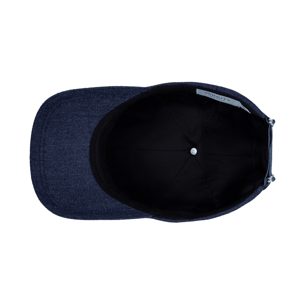 Inside view of a Varsity Headwear legacy structured cashmere navy herringbone baseball cap 